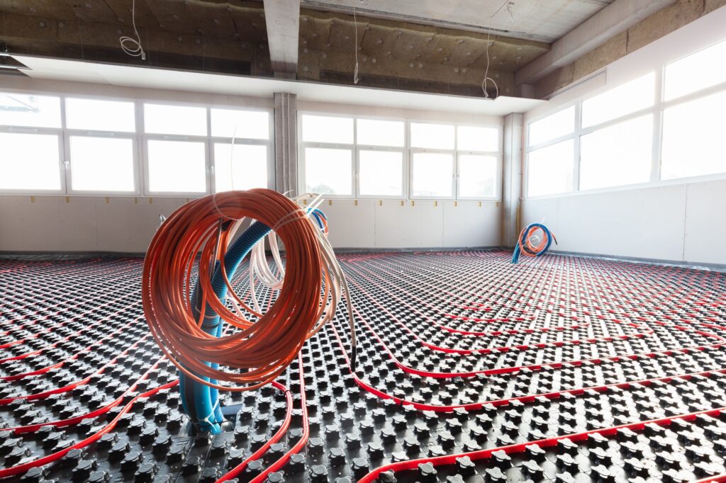 Floor heating and electrical outputs in a new building. Interior design